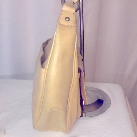 WILSONS LEATHER tan shoulder hand bag. Bronze hardware. Zipper closure on top. - Picture 6 of 15